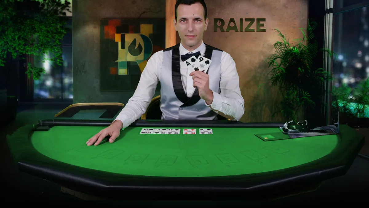 Dealer pictured behind a green poker table with cards